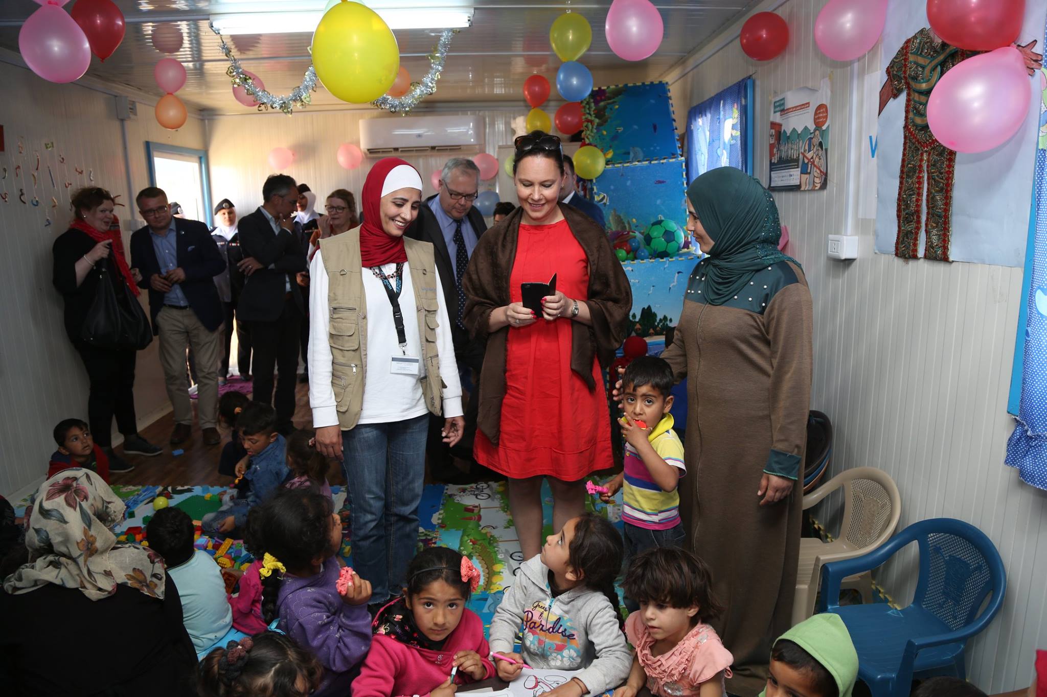 Mrs. Virolainen had the chance to greet women within each of the sectors available to the women and girls livelihood centre including the childcare and nursery facilities. Photo source: UN Women/ Ghaith Al Bahri
