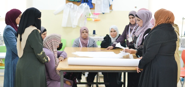 Najwa and her students during a Tailoring class at the UN Women Oasis centre in Ajloun, Jordan. Photo: UN Women/Bashar Al-Jabari