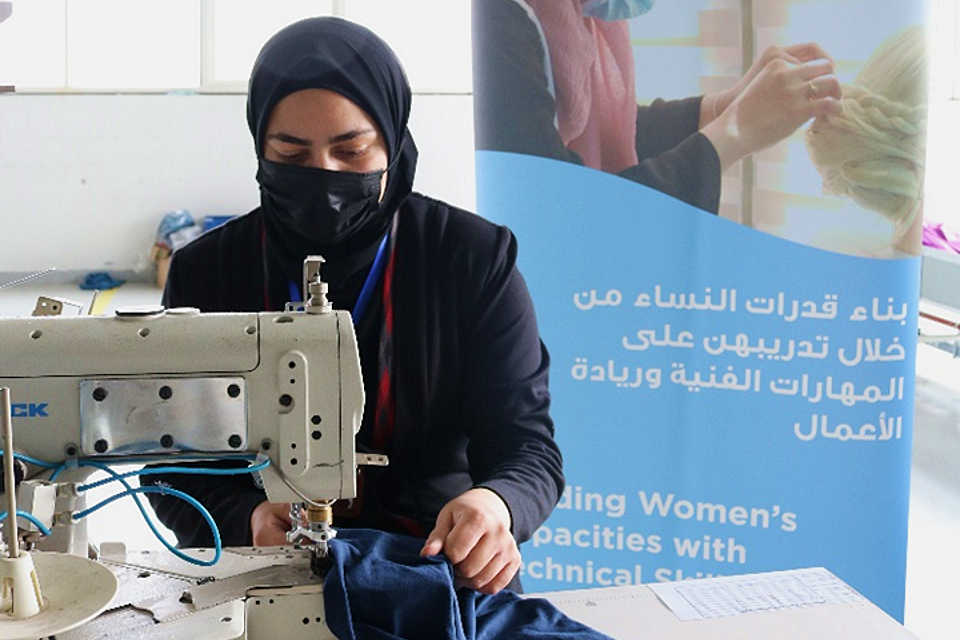 Eman Al-Momani, 20, is another graduate of the EFE-Jordan garment training programme. 
