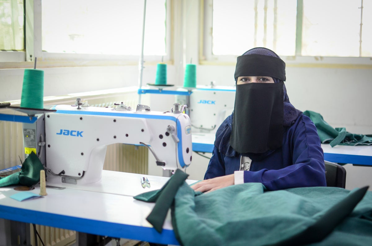 Nedaa during the tailoring class at Al-Muwaqqar Oasis Centre.
