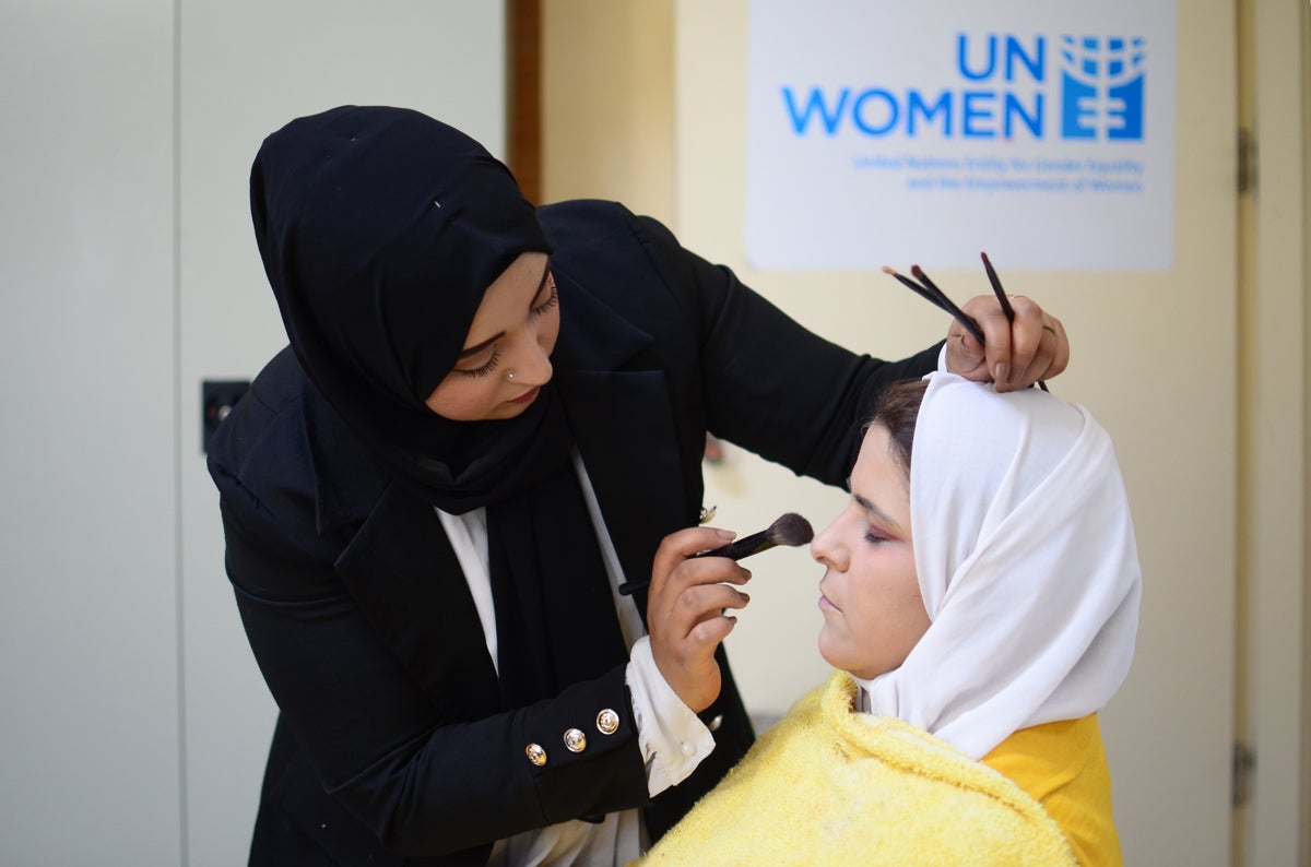 Nouf during the hairstyling class at Al-Muwaqqar Oasis Centre. 