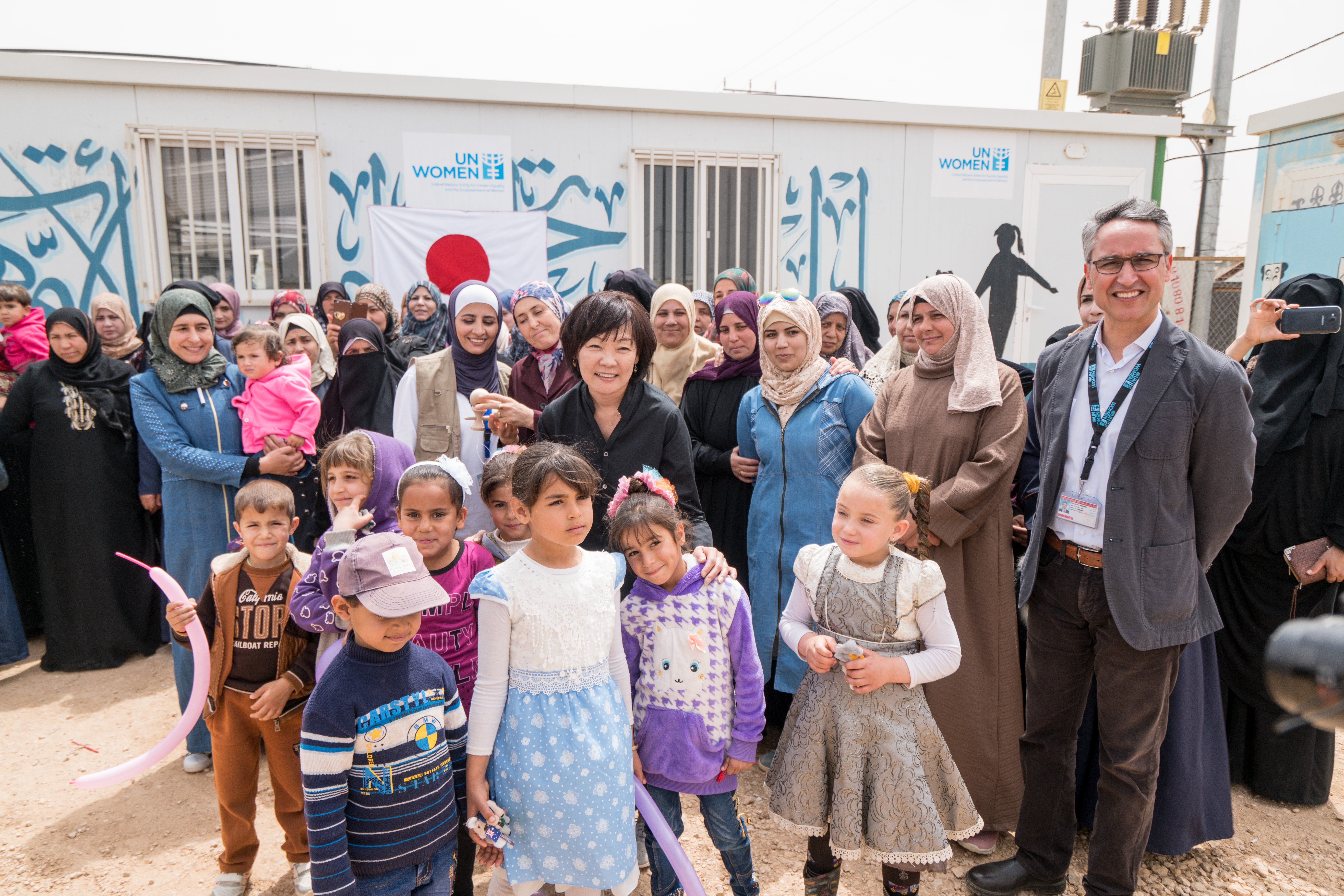 The First Lady of Japan, Mrs. Akie Abe and UN Women Country Representative Mr. Ziad Sheikh, received a warm welcome from the women and girls within the UN Women Oasis. Photo Source UN Women/Christopher Herwig