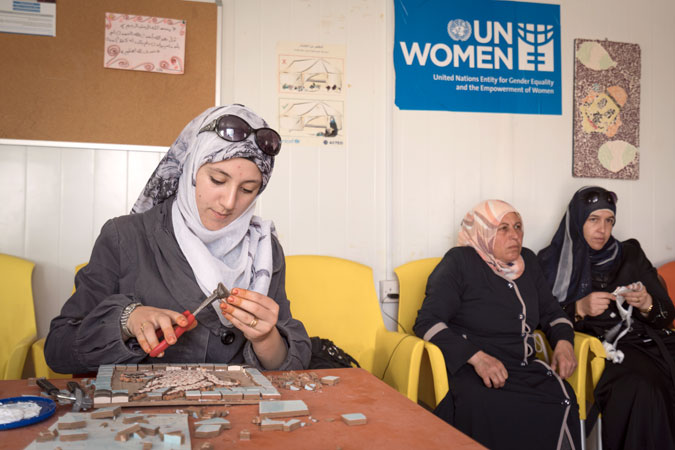 Syrian women attend a handicraft workshop. (UN Women/Christopher Herwig)