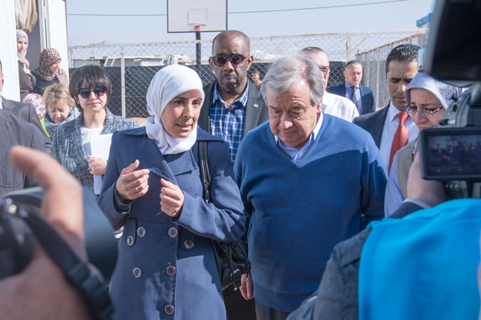 Ibtisam Majareesh, head of the refugee camp women’s committee and member of the camp refugee committee briefs UN Secretary-General António Guterres on cash-for-work opportunities available for Syrian refugee women at the UN Women-run centre in the Za’atari refugee camp. Photo: UN Women/ Benoît Almeras
