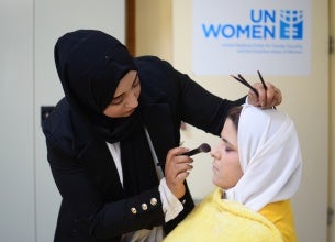 Nouf during the hairstyling class at Al-Muwaqqar Oasis Centre. 