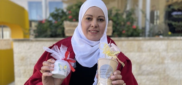 Safa Ahmad Sayeda, with some of the products that she makes and sells.